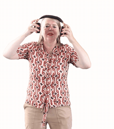 A Woman Wearing Headphones And A Shirt With A Pattern That Says S On It GIF
