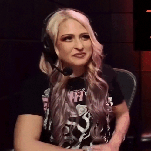 A Woman Wearing Headphones And A T-Shirt That Says ' Ns ' On It GIF