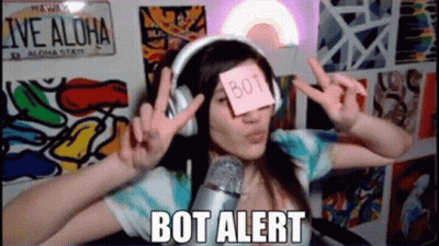 A Woman Wearing Headphones Has A Sticky Note On Her Eye That Says Bot GIF