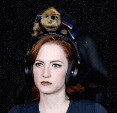 A Woman Wearing Headphones Has A Teddy Bear On Her Head And The Caption Says The Audacity GIF