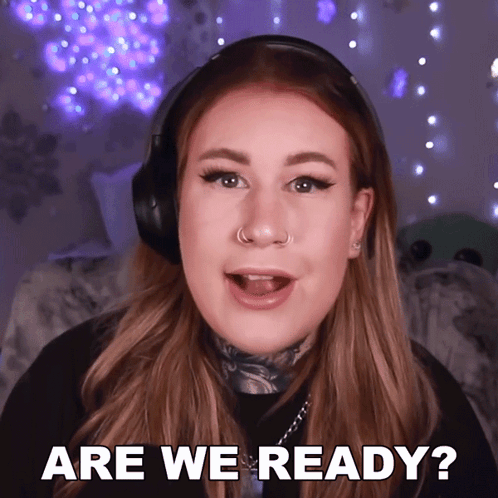 A Woman Wearing Headphones Is Asking If She Is Ready GIF