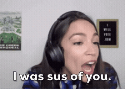 A Woman Wearing Headphones Is Making A Funny Face And Saying `` I Was Sus Of You . '' GIF