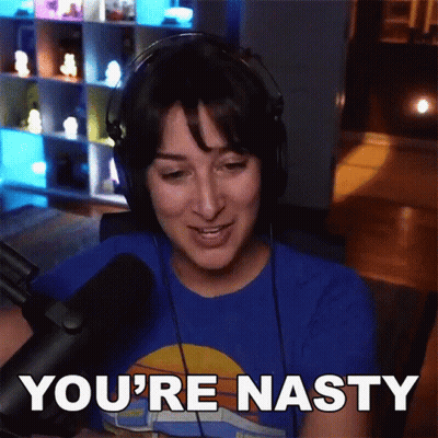 A Woman Wearing Headphones Is Saying You 'Re Nasty GIF