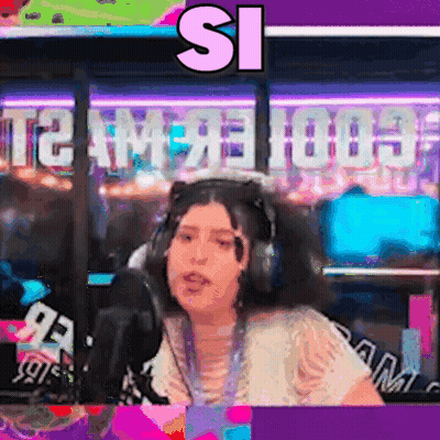 A Woman Wearing Headphones Is Sitting In Front Of A Microphone And The Word Si Is Above Her GIF