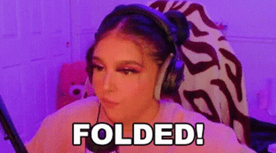 A Woman Wearing Headphones Is Sitting In Front Of A Microphone With The Words Folded Written On Her Face . GIF