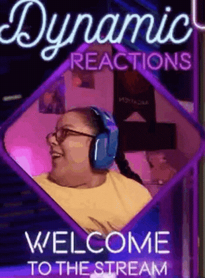 A Woman Wearing Headphones Is Sitting In Front Of A Neon Sign That Says `` Welcome To The Stream '' . GIF
