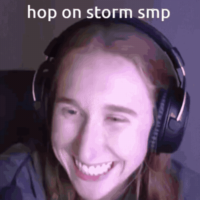 A Woman Wearing Headphones Is Smiling With The Words Hop On Storm Smp Written On Her Face . GIF
