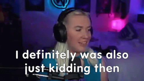 A Woman Wearing Headphones Is Talking Into A Microphone And Says `` Definitely Was Also Just Kidding Then '' . GIF
