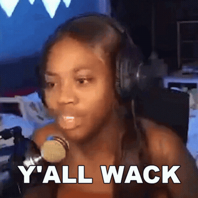 A Woman Wearing Headphones Is Talking Into A Microphone And Says Y 'All Wack GIF