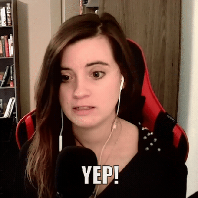 A Woman Wearing Headphones Is Talking Into A Microphone And Says Yep . GIF