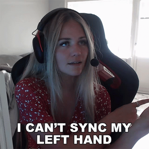 A Woman Wearing Headphones Says I Can T Sync My Left Hand GIF