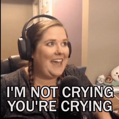 A Woman Wearing Headphones Says " I 'M Not Crying You 'Re Crying " In Front Of A Microphone GIF