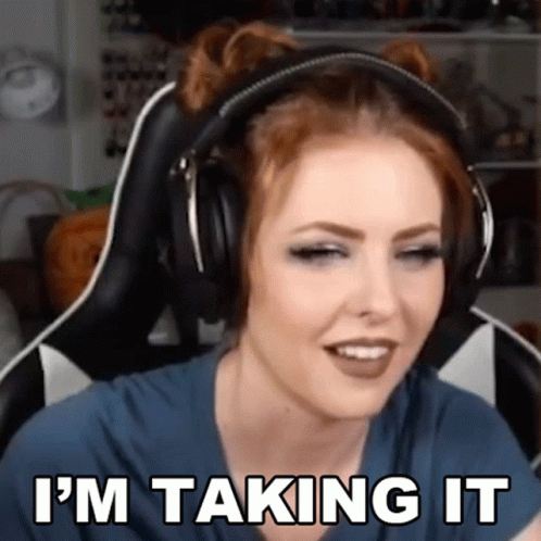 A Woman Wearing Headphones Says " I 'M Taking It " GIF