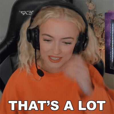 A Woman Wearing Headphones Says " That 'S A Lot " While Sitting In A Chair GIF