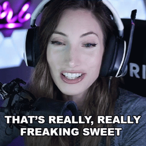 A Woman Wearing Headphones Stands In Front Of A Microphone And Says That 'S Really Freaking Sweet GIF