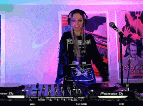 Woman With Headphones In Front Of DJ Mixer GIF