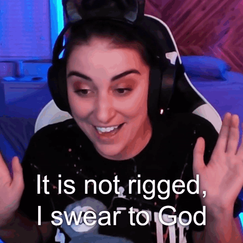 A Woman Wearing Headphones With The Words It Is Not Rigged I Swear To God GIF