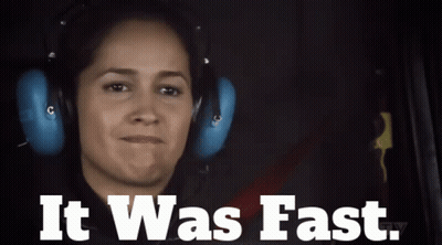 A Woman Wearing Headphones With The Words " It Was Fast " Below Her GIF