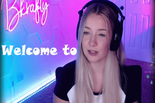 A Woman Wearing Headphones With The Words Welcome To Behind Her GIF