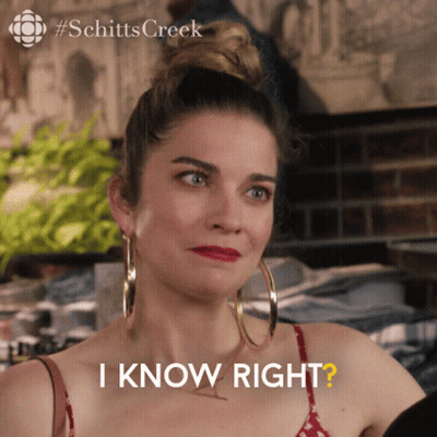 A Woman Wearing Hoop Earrings Is Asking If She Knows Right GIF