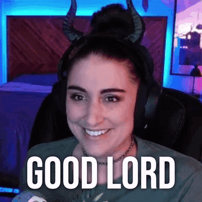 A Woman Wearing Horns And Headphones Is Smiling And Saying Good Lord . GIF