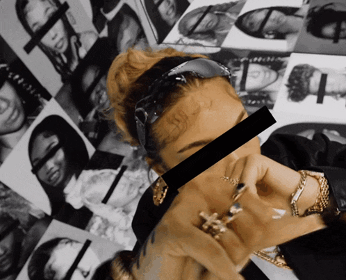 A Woman Wearing Sunglasses And A Bandana Has A Black Tape Over Her Eyes GIF