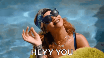 A Woman Wearing Sunglasses And A Bandana Is Laying In A Pool And Says Hey You . GIF