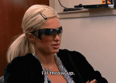 A Woman Wearing Sunglasses And A Fur Coat Is Saying I 'Ll Throw Up . GIF