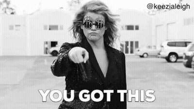 A Woman Wearing Sunglasses And A Suit Is Pointing At The Camera And Says `` You Got This '' . GIF