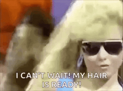 A Woman Wearing Sunglasses And A Wig Says `` I Can 'T Wait My Hair Is Ready ! '' GIF