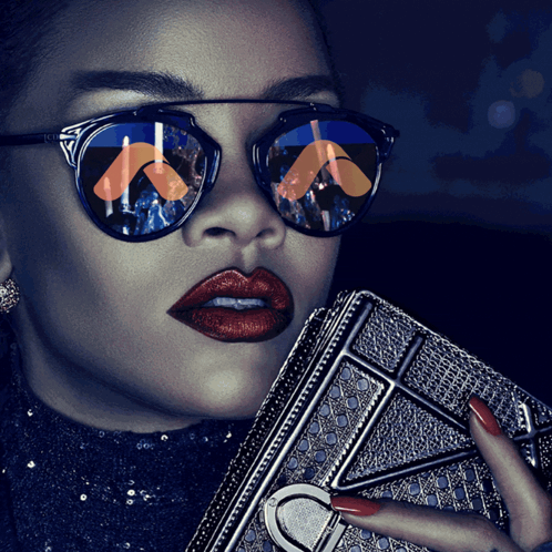 A Woman Wearing Sunglasses And Red Lipstick Holds A Purse GIF