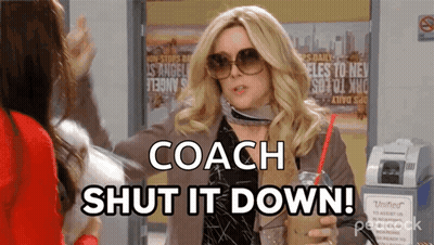 A Woman Wearing Sunglasses Is Holding A Drink And Says Coach Shut It Down GIF