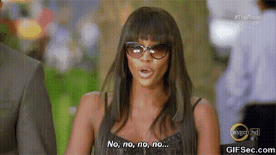 A Woman Wearing Sunglasses Is Saying No , No , No , No .. GIF