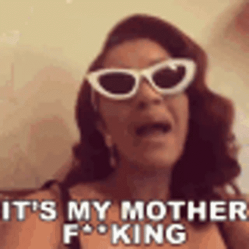 A Woman Wearing Sunglasses Is Screaming And Saying `` It 'S My Mother Fucking '' . GIF