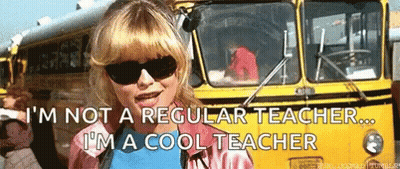 A Woman Wearing Sunglasses Is Standing In Front Of A Yellow School Bus And Says I 'M Not A Regular Teacher . GIF