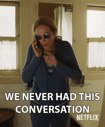 A Woman Wearing Sunglasses Is Talking On A Cell Phone And Says " We Never Had This Conversation Netflix " GIF