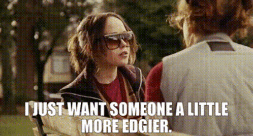 A Woman Wearing Sunglasses Is Talking To Another Woman And Says " I Just Want Someone A Little More Edgier " GIF