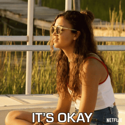 A Woman Wearing Sunglasses Says It 'S Okay On A Netflix Poster GIF