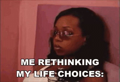 A Woman Wearing Sunglasses Says Me Rethinking My Life Choices GIF