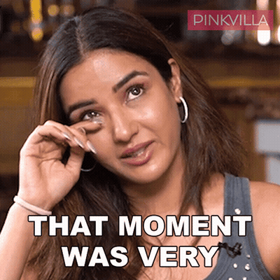 A Woman Wipes A Tear From Her Eye With The Words That Moment Was Very Below Her GIF