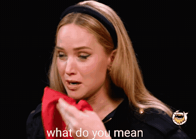 A Woman Wipes Her Face With A Red Cloth And The Words What Do You Mean Are Next To Her GIF