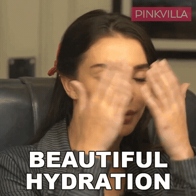 A Woman Wipes Her Face With Her Hands And The Words Beautiful Hydration Are Written Above Her GIF