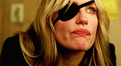 A Woman With A Black Eye Patch On Her Eye GIF