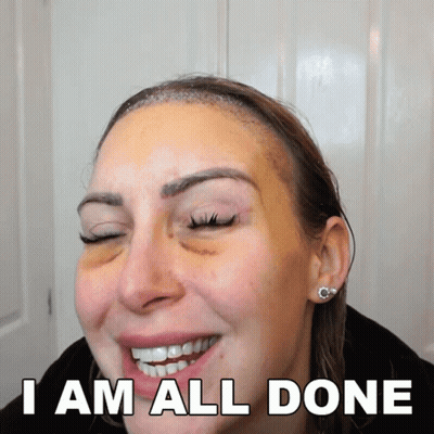 A Woman With A Black Eye Smiles With The Words " I Am All Done " Behind Her GIF