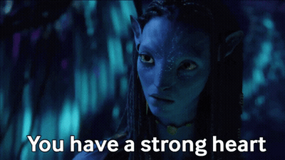 A Woman With A Blue Face And The Words " You Have A Strong Heart " GIF