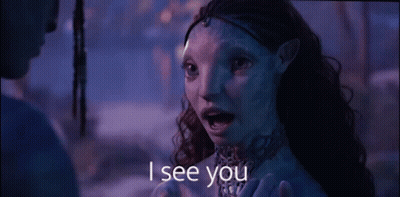 A Woman With A Blue Face Is Talking To A Man With The Words I See You Above Her GIF