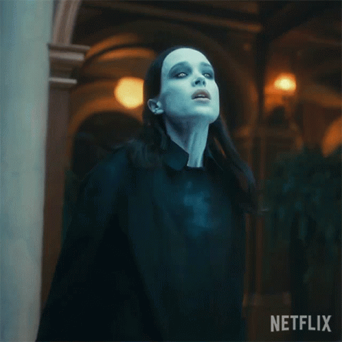 A Woman With A Blue Light Coming Out Of Her Chest And A Netflix Logo On The Bottom GIF