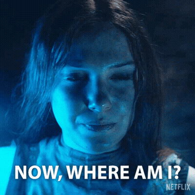 A Woman With A Blue Light On Her Face Says Now Where Am I Netflix GIF
