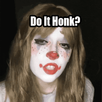 A Woman With A Clown Face Painted On Her Face And The Words Do It Honk GIF