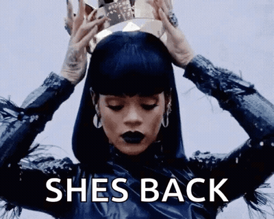 A Woman With A Crown On Her Head And The Words She 'S Back Behind Her GIF